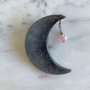 Crescent moon pin with pink charm